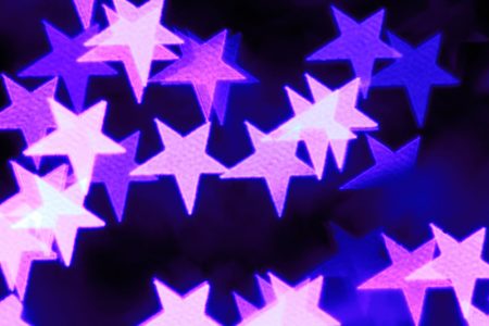 Purple stars on a black background